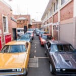 Cars parked two deep in Alley protesting carparking fines