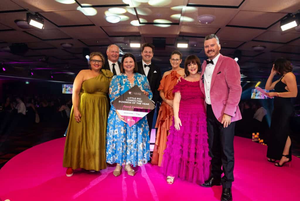 Celebrating Business of the Year on stage at the BEA's 2024